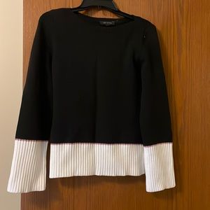 Ann Taylor sweater.  Black Cream w/small mauve strip.